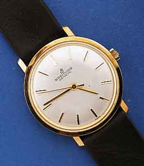 BREITLING HERRENARMBANDUHR, SCHWEIZ UM 1962, METALL VERG., EDELST.-BD. GESCHR., UNGETR. LAGERW., REF.NR. 2936, VERS. BL., HANDAUFZUG, KAL. FELSA ...