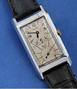 TENOX HERRENARMBANDUHR DOCTORSWATCH, NICKEL/CHROM-GEH., RECT.-FORM, BODENSCHARN., IN SICH LT. GEW., TYP. AUS D. MITTE GEZ. ZEIGERACHSE FÜR ...