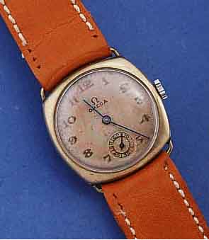 OMEGA HERRENARMBANDUHR, SCHWEIZ UM 1935, NICKEL, CARREE-CAMBREE-GEH., BL. FL., BOD. U. GLASR. AUFGEDR., HANDAUFZ., RUNDANKERW., 15 ST., KAL. 26,5 ...