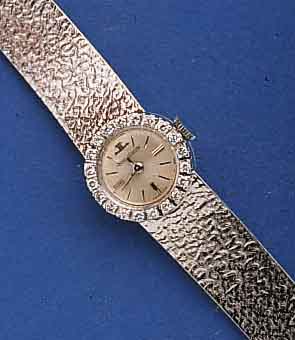 JAEGER LECOULTRE DAMENSCHMUCKBANDUHR, SCHW. UM 1968, NEUTR. WG 585/000-GEH. INCL. WG-BAND, RHOD., LÜN. M. DIAMANTBES., BOD. AUFGEDR., ...