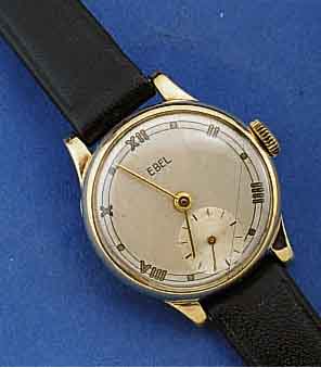 EBEL DAMENARMBANDUHR ART-DECO, SELTEN, SCHW. UM 1940, PLAQUE-D`OR-GEH. (20 MICRON), BOD. U. GLASRAND AUFGEDR., 2-FARB. VERSILB. ORIG-BL. U. ZEIGER ...