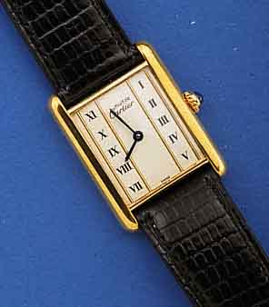 CARTIER HERRENARMBANDUHR, TANK, MAßE CA. 31X 23 MM, HIGH-TECH-QUARTZWERK, LEDERBD., STER- LING-SILBER M. 20 MICRON GG-AUFL., CREMEFARB. ...