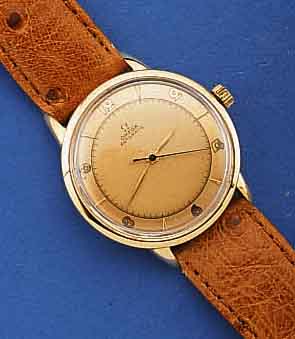 OMEGA HERRENARMBANDUHR, HAMMERAUTOMATIK, SCHWEIZ/USA UM 1950, GG-FILLED, 2-FARB. ORIG.- BL. LT. FLECKIG, WERK ROT VERG., 17 ST., KAL. 28,10, ...