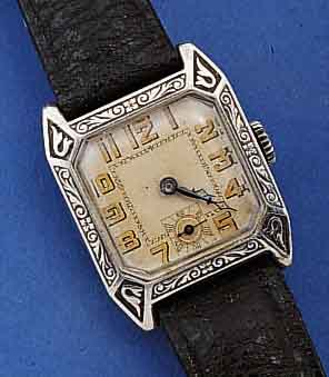 HERRENARMBANDUHR, SCHWEIZ F. D. DEUTSCH. MARKT UM 1924, 935ER SILBER, RAND GEPRÄGT VER- ZIERT, BOD.-SCHARNIER IN SICH LT. GEW., ORIG. BL., ALTE ...
