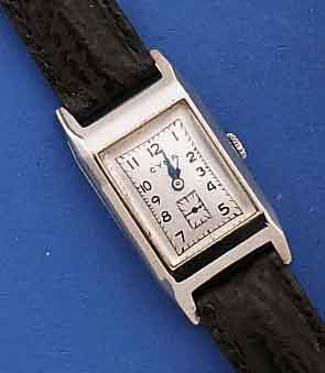 KONVOLUT: 2 HERRENARMBANDUHREN, RECT.-FORM, SCHWEIZ, 30ER JAHRE, 1X CYMA, METALL VERCHR., EDELST.-BOD. AUFGEDR., BL. REST., SELTENES PLATINENWERK ...