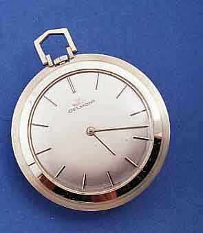 DELMONT FRACKUHR, 18 CT. WG, SCHWEIZ UM 1966 , VERSILB. BL., AUFWEND. WG-STUNDENZEICHEN M. ONYXEINLAGE, WG-ZEIGER, RUNDANKERWERK V. PES- EUX, ...