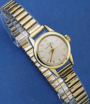 ETERNA MATIC DAMENARMBANDUHR, SCHWEIZ UM 1956, EDELST., BOD. GESCHR., MASS. GG-LÜN., STARKE GG-SCHULTERN, ZENTRALROT. KUGELGEL., GLYC.-UNR., ...