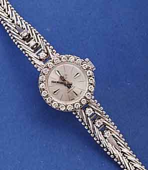 KORES DAMENSCHMUCKBANDUHR, SCHWEIZ/DEUTSCH- LAND UM 1965, AUFW. GG 585/000 GEH. INCL. FEINGLIEDERBD., LÜN. SOWIE BANDANS. M. DIAMANTBES., ZUS. 26 ...