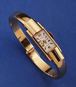 ARDAN DAMENSPANGENUHR, SCHWEIZ UM 1950, GG 750/000, KONKAVGL., BOD. AUFGEDR., BAGUETTE- ANKERFORMWERK, BAUWEISE FHF, 17 ST., SCHR.- UNR., ...