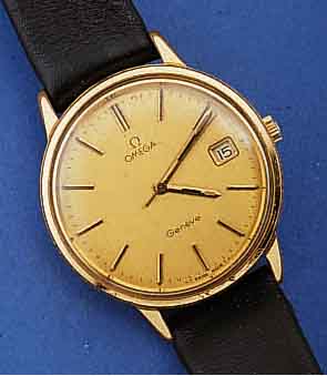 OMEGA HERRENARMBANDUHR GENEVE, AUTOMATIK, METALL VERG., BER., EDELST.-BOD. GESCHR., SCHWEIZ UM 1976, WERK VERG., ZENTRALROT., 23 ST., KAL. 1030, ...