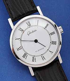 GLASHÜTTE HERRENARMBANDUHR, DEUTSCHLAND UM 1984, METALL HART VERCHR., EDELST.-BOD. AUFGE- DR., EMAILFARB. KONTRASTZIFFERBL., FORMANKER- WERK, KAL. ...