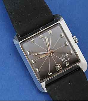 DOXA HERRENARMBANDUHR, AUTOMATIC, SERIE GRAFIC , AUFWEND. EDELST.-STÜLPGEH. M. ARRET. IN- NENRING, BEI FERTIGST. WASSERD., SCHWEIZ UM 1972, EXTREM ...