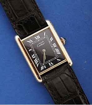 CARTIER HERRENARMBANDUHR TANK, SCHWEIZ, 925ER SILBER, HART VERG., BOD. SEITL. 4-FACH VERSCHR., HANDAUFZUG, MINERALGL., SCHMUCKKRONE , ORIG. ...