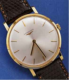 LONGINES HERRENARMBANDUHR, SCHWEIZ, UNGETR. LAGERW. U 1962, METALLGEH. M. GOLDAUFLAGE (40 MICRON !), NEUTR. BAND, ORIG. STIFTSCHL., BOD. U. ...