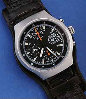 MILITARY ARMBANDCHRONOGRAPH, F. D. BUND, SO GRAV. AUF GEH.-BOD., AUTOMATIK, MATT. EDELST.- GEH., BOD. U. KRONE GESCHR., BEI FERTIGST. WASSERD. BIS ...