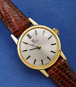 OMEGA DAMENARMBANDUHR, SCHWEIZ UM 1965, METALL, GG-AUFLAGE (20 MICRON), EDELST., BOD. U. GLASRAND AUFGEDR., VERSILB. KONTRASTZIFFER- BL., AUFGEL. ...