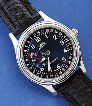 ORIS HERRENARMBANDUHR, AUTOMATIK, SCHWEIZ UM 1996, EDELST. POL., BEIDSEITIG SAPHIRFLACHVER- GL., KLASSISCHE DAT.-ANZ. AUF ZIFFERBL.AUßEN- KRANZ, ...