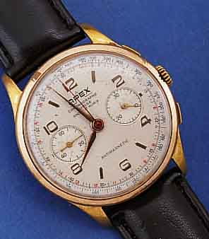 LANDERON ARMBANDCHRONOGRAPH, KAL.48, SCHWEIZ UM 1947, METALLGEH. VERG., BER., EDELST.-BOD. U. GLASRAND AUFGEDR., VERSILB. BL., TELE- U. ...