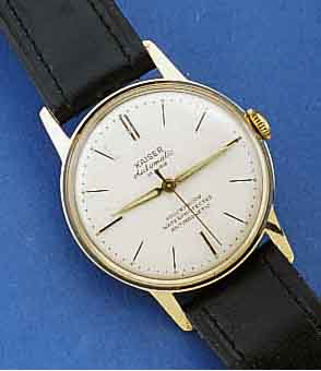 KAISER HERRENARMBANDUHR, F.D. DTSCH. MARKT UM 1959, METALL GG-AUFL., EDELST.-BOD., AUTO- MATIK, KAL. 20, IN GER. STÜCKZ. GEFERT., 25 ST., ...