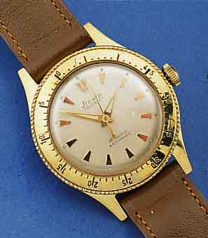 STOWA HERRENARMBANDUHR TOTOMAT, F.D. DTSCH. MARKT UM 1960, METALL GG-AUFL., EDELST.-BOD., DREHLÜN. M. 60ER TEILUNG, 17 ST., HANDAUFZ., STOßGES., ...