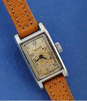 ETERNA DAMENARMBANDUHR, FRÜHE WASSERD. AUSF. , SCHWEIZ UM 1940, EDELST., STÜLPGEH., BOD. GEG. OBERTEIL 4-FACH VERSCHR., EINLEGEGL., GET. A-WELLE, ...