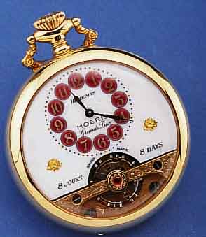 HEBDOMAS/MOERIS OFFENE HERRENTASCHENUHR MIT ACHTTAGEWERK, REPLIKA VON CA. 1918, GEFERT. WOHL 70ER JAHRE, METALL VERG. (10 MICRON), EMAILZIFFERBL. ...