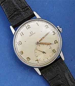 OMEGA HERRENARMBANDUHR, SCHWEIZ UM 1946, EDELST., BOD. U. GLASRAND AUFGEDR., AUßER KRONE U. LEDERBD. ORIG. ZUSTAND, ALTE LEUCHT- FARBE BRÜCHIG, ...