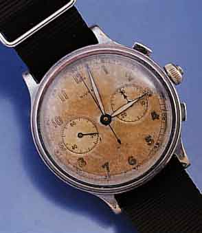 NIVREL ARMBANDCHRONOGRAPH, SCHWEIZ UM 1936, METALL VERCHR., EDELST.-BODEN U. GLASR. GEDR., D. CA. 40 MM, ORIG.-BLATT FL., 30-MIN.-STOPP- ZÄHLER, ...