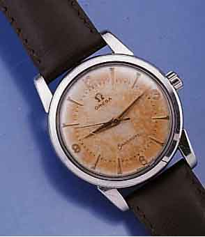 OMEGA HERRENARMBANDUHR SEAMASTER, EDELST., BODEN GEDR., VERS. ORIG.-BLATT, ALTERSBED. FARBL. GET., LEDERB. NEU, WERK VERG., HANDAUF- ZUGKAL. 420, ...