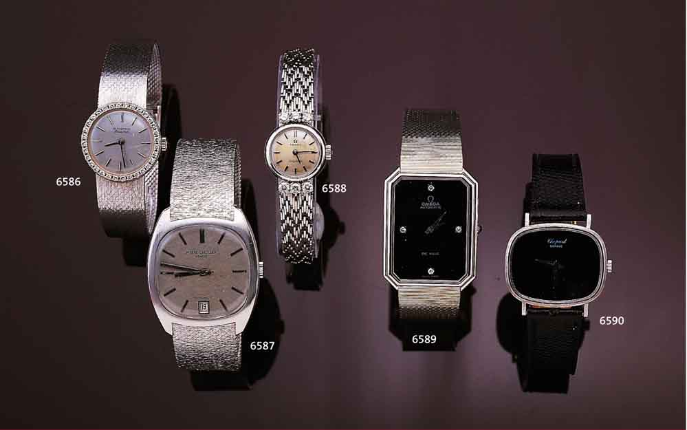 OMEGA DAMENSCHMUCKBANDUHR LADYMATIC, WG 750/000-GEH. INCL. WG-BAND, SCHWEIZ UM 1963, BODEN GEDR., BANDANS. AUFWEND. M. 6 BRILLANTEN ZUS. CA. 0,75 ...