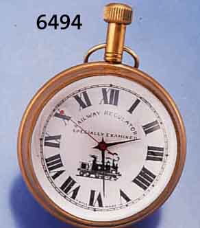 SCHREIBTISCHKUGELUHR MIT EINGEBAUTEN ARMBAND- UHRRUNDWERK, 17 ST., KAL. UNGED., MESSING- AUßENTEIL, EMAILFARB. BLATT, BEZ. RAILWAY REGULATEUR, ...