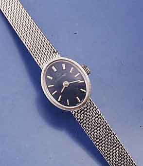 CERTINA DAMENGOLDBANDUHR, SCHWEIZ UM 1970, WG 585/000 INCL. WG-FLECHTB., RHOD., BODEN GEDR., AUFGES. WG-STD.-ZEICHEN, WG-ZEIGER, FORMANKERW., 17 ...