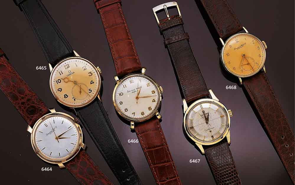 IWC HERRENARMBANDUHR, SCHWEIZ UM 1949, GG 750/000, RUNDGEH., BOD. AUFGEDR., GESPREIZTE GESTUFTE BANDANST. TEILW. AUS REP.-GRÜNDEN VERSTÄRKT ...