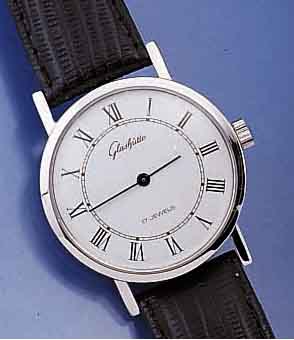GLASHÜTTE HERRENARMBANDUHR, DEUTSCHLAND UM 1984, METALL HARTVERCHR., EDELST.-BODEN GEDR., EMAILFARB. KONTRASTZIFFERBL., LEDERB., DAMEN- ...