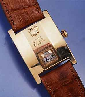 LORD ELGIN HERRENARMBANDUHR MIT DIGITALANZEIGE , USA UM 1958, GG-FILLED GEH., ZEITANZEIGE DURCH ROTIERENDE ZEIGERSCHEIBEN FÜR STD. U. MIN. ...