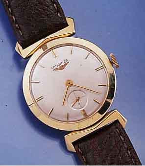 LONGINES HERRENARMBANDUHR, SCHWEIZ/USA UM 1953, GG 585/000, BET. BANDANST., GLASR. GE- DR., VERS. BLATT M. AUFGEL. GOLD-STD.-ZEICHEN, GOLDZEIGER, ...