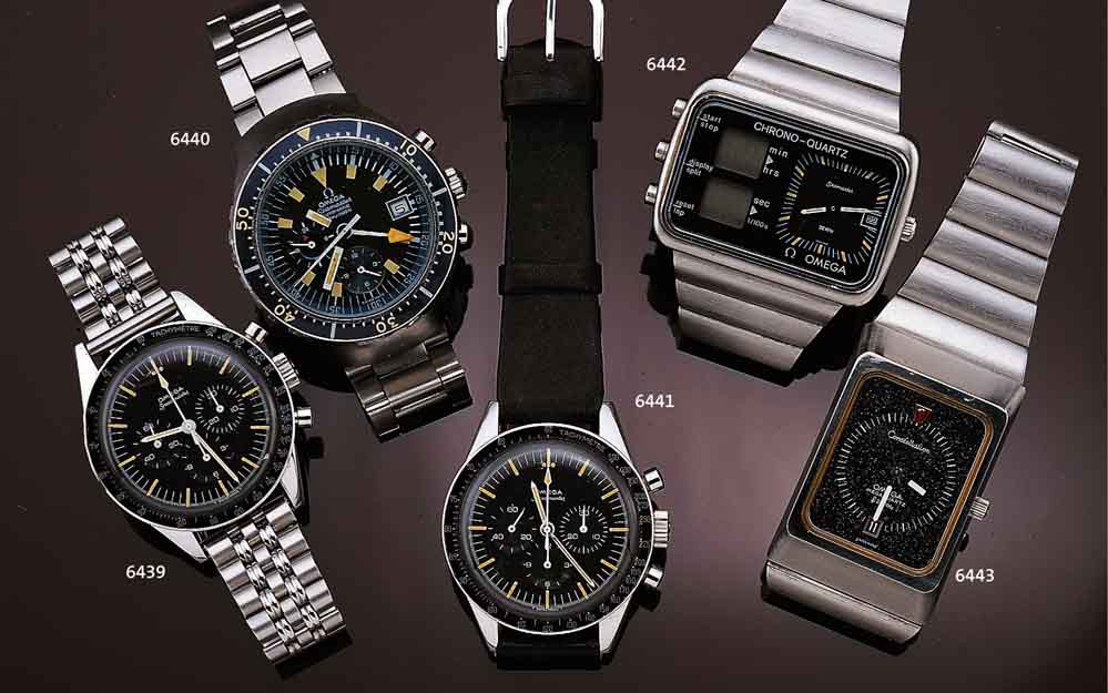 OMEGA HERRENARMBANDUHR CHRONOQUARTZ, EDEL- STAHL, EDELSTAHLBAND, BOD. 4-FACH VERSCHR., AB HERST. WASSERGESCH., AUF BODEN RELIEF. DARST. D. ...