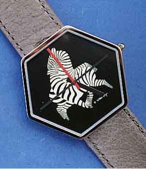 BULOVA DESIGNERARMBANDUHR VASARELY, SCHW. HIGH-TECH-QUARTZWERK MIT ZENTRALSEK., MESSING- GEH. SILBERGRAU PATINIERT, EDELSTAHLSPRENG- DECKEL 22 KT ...