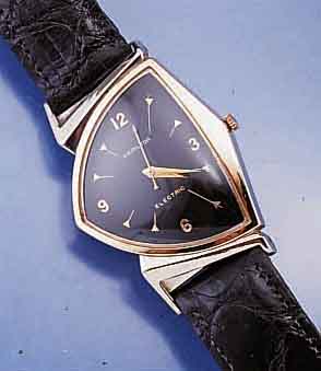HAMILTON HERRENARMBANDUHR ELECTIC, USA UM 1958, GG/WG-FILLED, BODEN AUFGEDR., FRÜHES ELEKTROMECH. WERK M. ANALOGANZ., SCHWINGKÖRPER , ...
