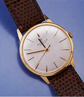 BREITLING HERRENGOLDUHR, AUTOMATIK, SCHWEIZ 1964, 750/000 GG, BOD. U. GLASR. AUFGEDR., AUßER LEDERBD. ORIG.-ZUST., VERSILB. BL. M. AUFGELEGT. ...