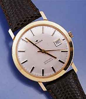 AMARA HERRENGOLDUHR, AUTOMATIK M. ZENTRALSEK. U. DAT., SCHWEIZ/DEUTSCHLAND UM 1965, GG 585/000, ZENTRALROT., ETA BASISKAL. 2783, IN- CABL., BOD. ...