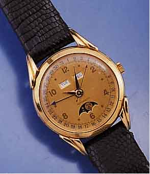 AS HERRENARMBANDUHR, SCHWEIZ UM 1961, AUTOMATIK M. VOLLKALENDERANZ. INCL. MONDPHASE, METALL HARTVERG., EDELST.-BODEN U. GLASR. GE- DR., ...