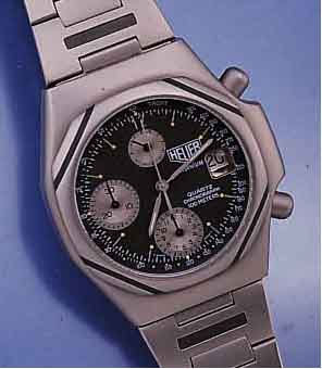 HEUER ARMBANDCHRONOGRAPH TITANIUM QUARTZ, TITANGEH. INCL. BAND, SAPHIRFLACHGL., DATUM M. LUPE, 30-MIN.- U. 12-STD.-STOPPZÄHLER, PERM. SEK. BEI 12, ...