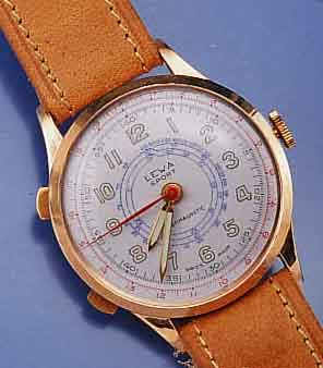 LEWA ARMBANDUHR, UNR.-STOPP DURCH DRÜCKER AUßEN 10, START AUßEN 8, METALL ROSEVERG., BODEN GEDR., ROSKOPFTYP. WERKAUFB., SCHWEIZ UM 1960, ...