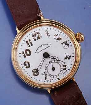 EBERHARD & CO CHAUX-DE-FONDS FRÜHE ARMBANDUHR, UM 1918, METALLGEH. NACHVERGOLDET, SCHR.- BOD. ALS DRUCKBODEN ERSETZT, ORIG.-EMAILBL. ...