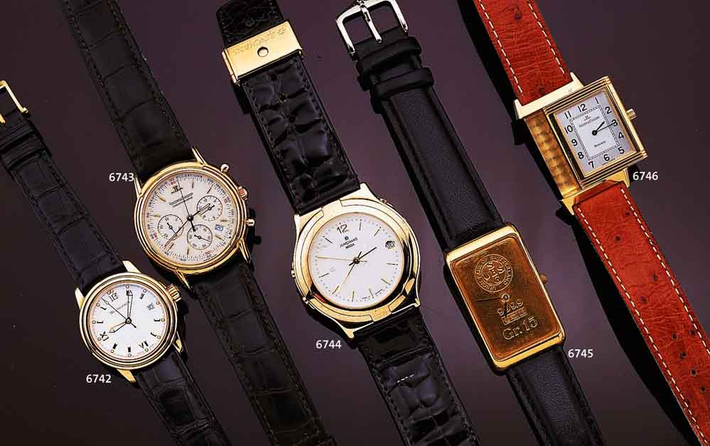 CORUM HERRENGOLDUHR IN FORM EINES 15 G FEIN- GOLDBARRENS DER SCHWEIZ, MASSIV GG 750/000 GEH., BODEN 4-FACH VERSCHR., SAPHIRFL.-GLAS, SCHWEIZ UM ...