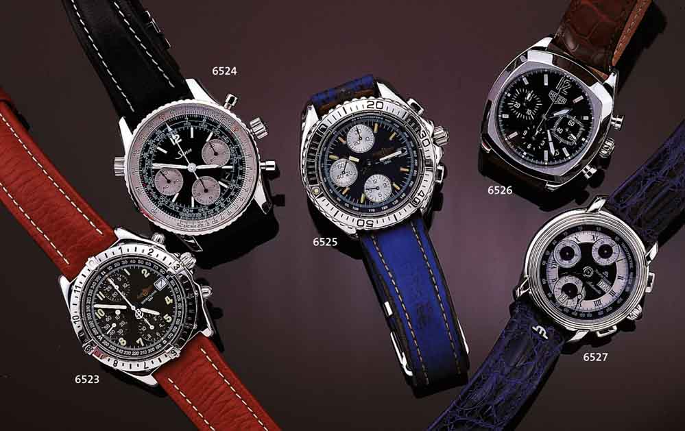 HEUER ARMBANDCHRONOGRAPH MONZA, SCHWEIZ UM 2000, AUTOMATIK, EDELST. POL. Z.T. MATT., CARREE-CAMBRE-FORM, BOD. 4-FACH VERSCHR.,SCHW. ...