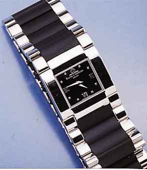 BAUME & MERCIER DAMENDESIGNERUHR, SCHWEIZ UM 1999, EDELST. POL., ZWISCHENGLIEDER D. EDELST. -BD. IN HOCHWERTIGEM KAUTSCHUK, DOPP. UNSICHT- B. ...