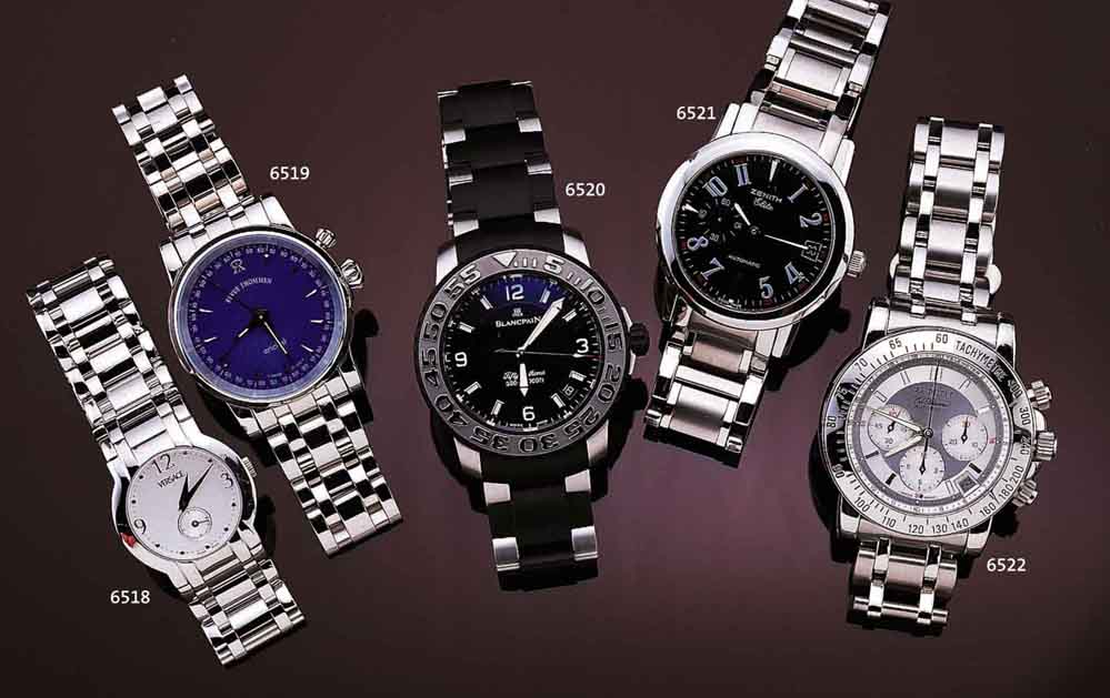 VERSACE DESIGNERDAMENARMBANDUHR, SCHWEIZ UM 1998, EDELST. POL. INCL. BAND M. DOPP. UN- SICHTB. FALTSCHL., BOMB. SAPHIRGL., HIGH-TECH- QUARTZW., BEI ...