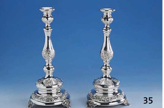 Kerzenleuchterpaar, Portugal, 920er Silber, gefÜllt, total ca. 2300 g, reicher floraler Dekor, prunkvoll, H ca. 35 cm